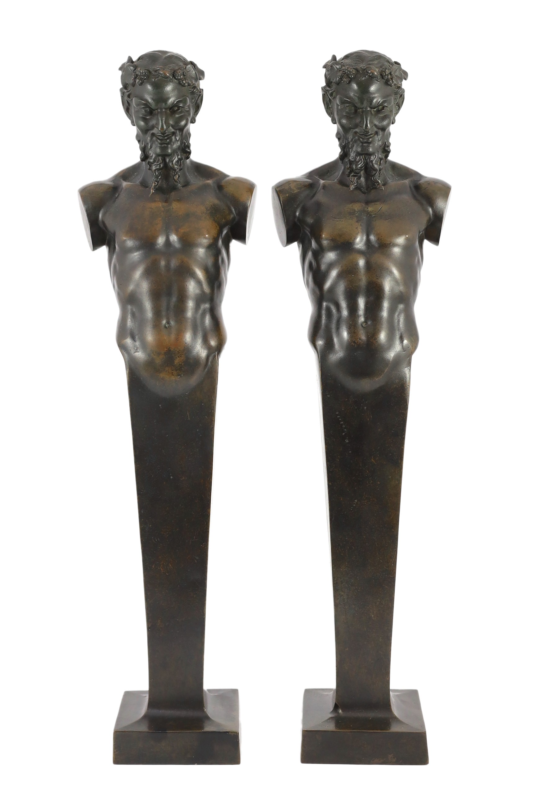 A pair of early 20th century French bronze terms, each in the form of a satyr, 16cm wide 62cm high